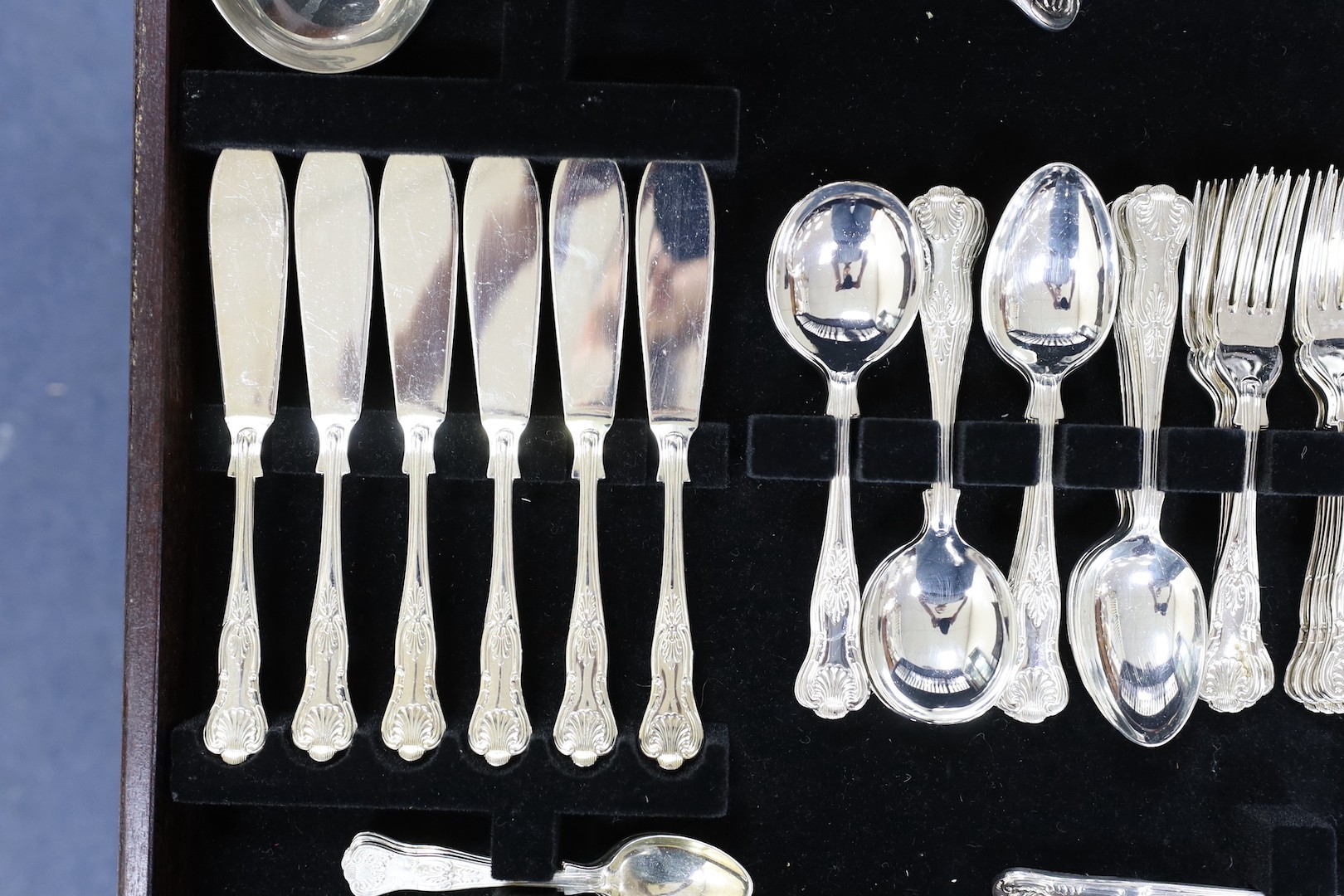 A leather inset canteen of silver plated flatware